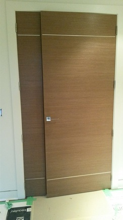 Walnut Doors with Metal Inlays